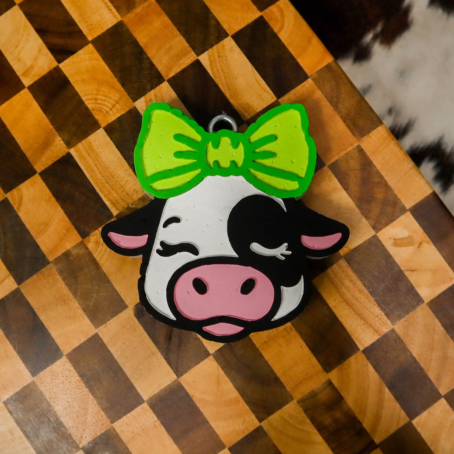 Spotted Cow with Bow